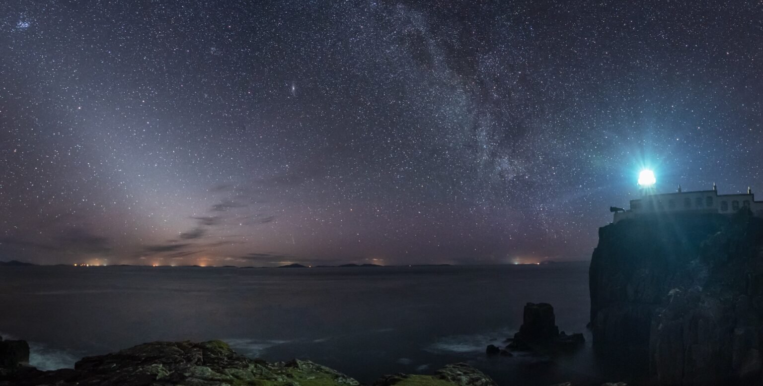 Milky Way over Neist Point Lighthouse on the Isle of Skye, Outer Hebrides, Scotland. Taken on our Isle of Skye photography workshop and tour