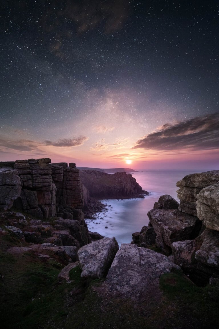 Rising moon over Lands End in Cornwall