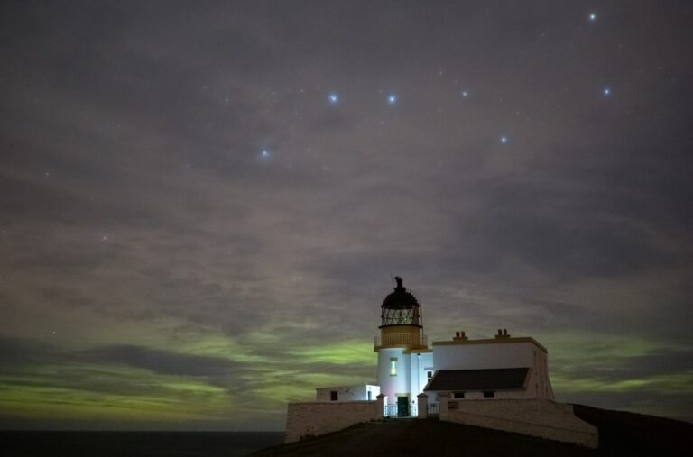 Northern Lights and Big Dipper over Stoer Lighthouse in Scotland